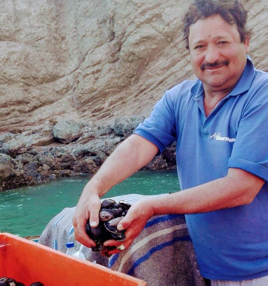 La Caleta del Inca-Seafood Fisherman with Mollusc